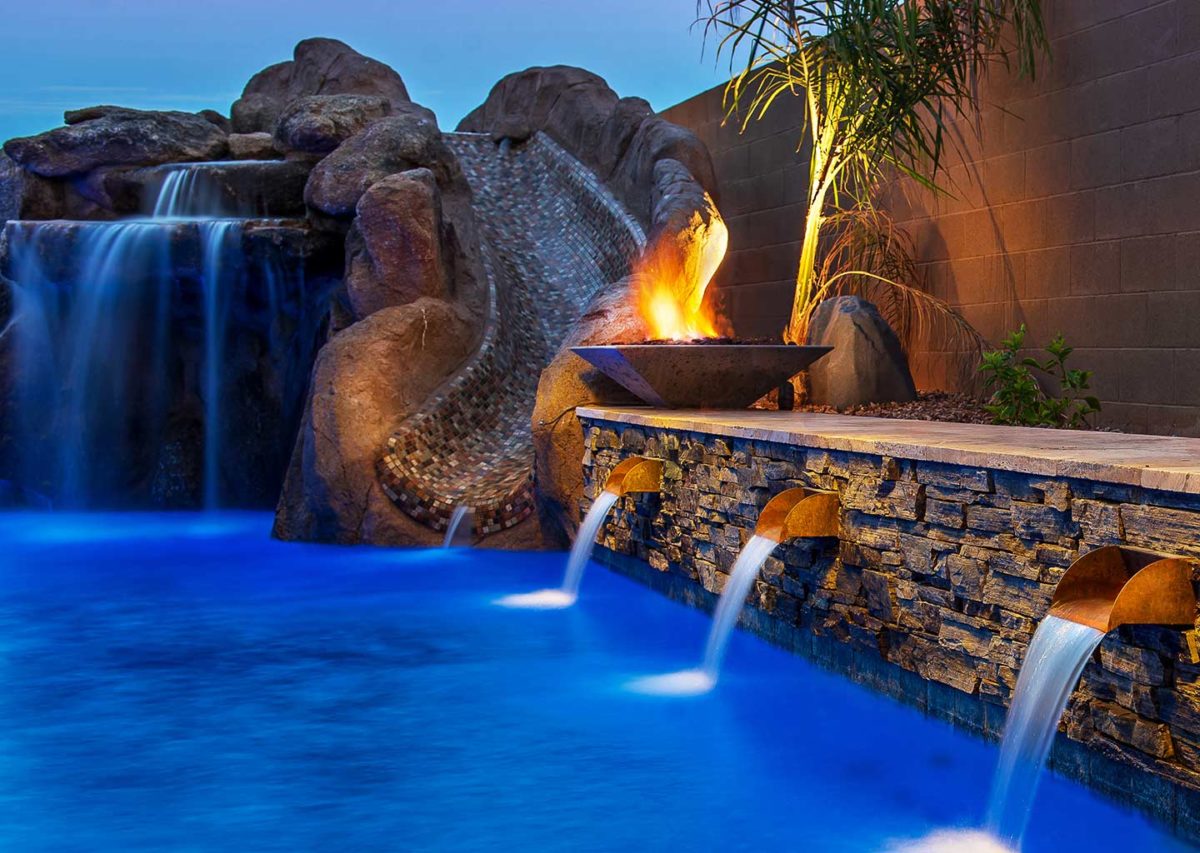 photo of Fire and Water features by a swimming pool
