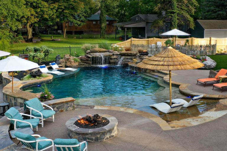 photo of a resort style backyard pool design in PebbleTec PebbleBrilliance Tropicana Pool Finish submitted for World's Greatest Pools 2019