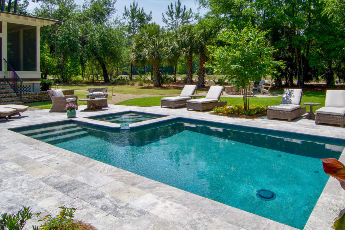 photo of a backyard pool design in PebbleTec Caribbean Blue Pool Finish medium blue water color